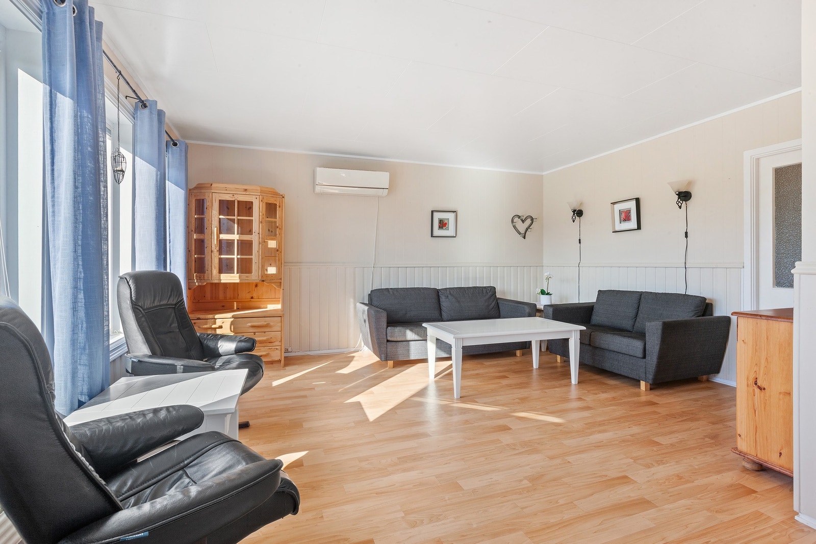 Varmepumpe i stuen gir en behagelig varme. Galleribilde