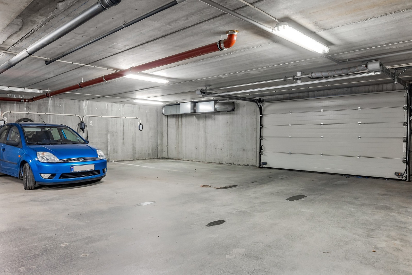Leiligheten har egen parkeringsplass i parkeringskjeller Galleribilde