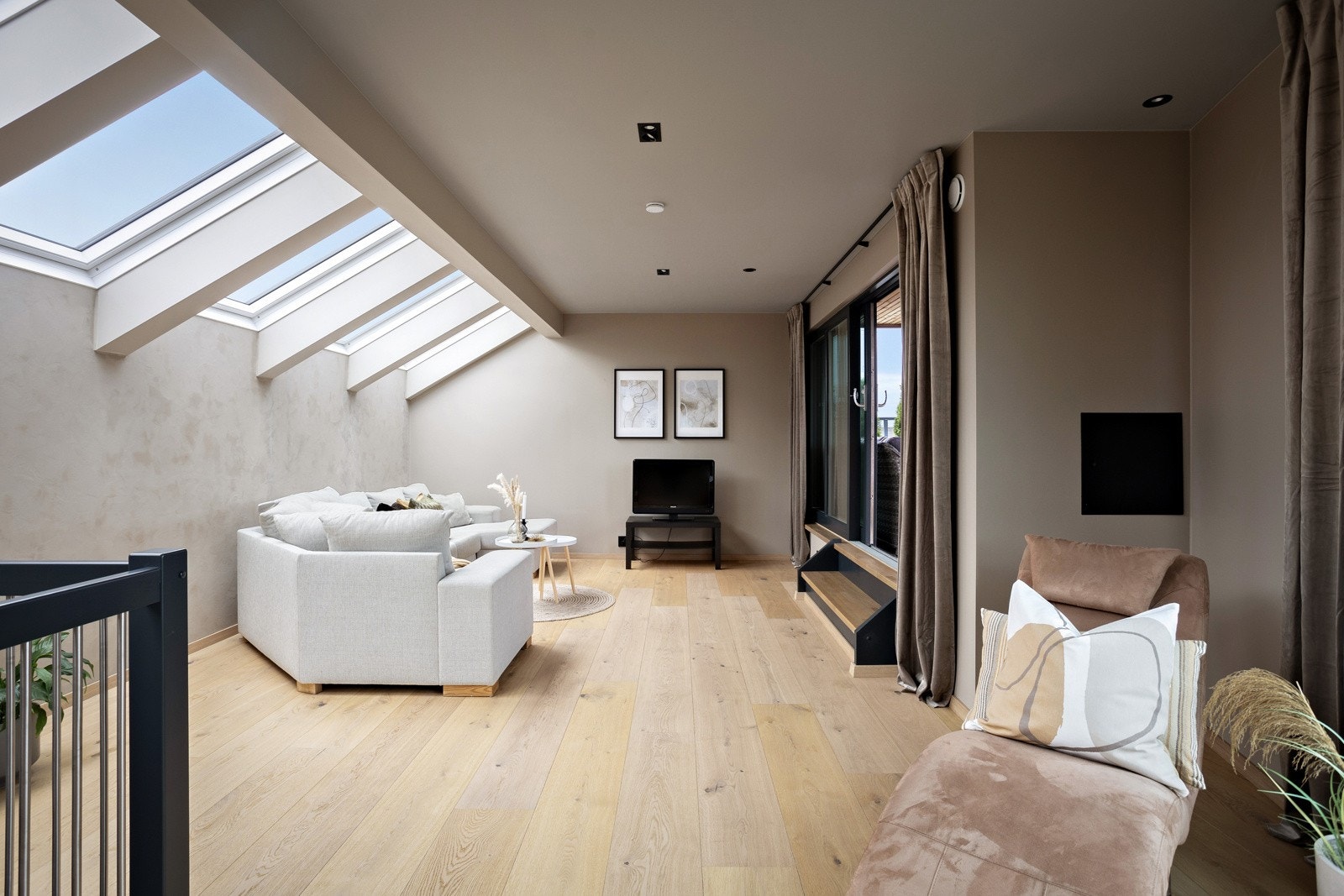 I husets øverste etasje ligger ytterligere en stue med wow-faktor. Galleribilde