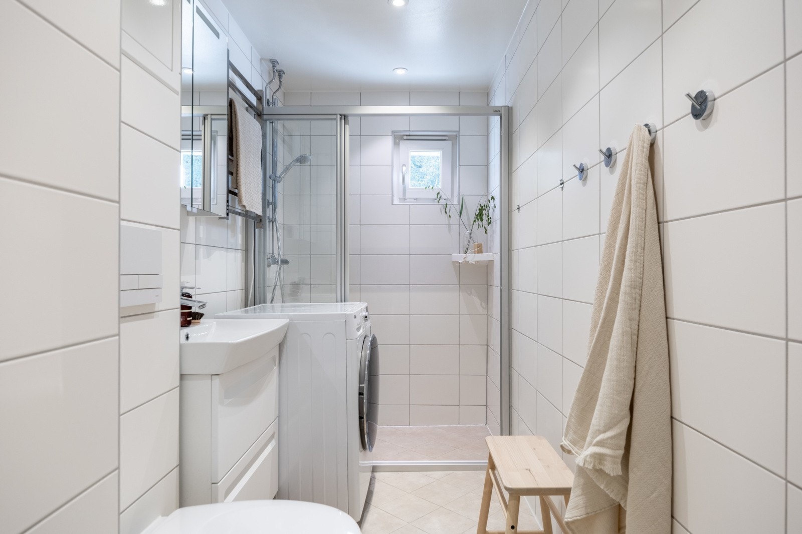 Badet har opplegg for vaskemaskin. Galleribilde