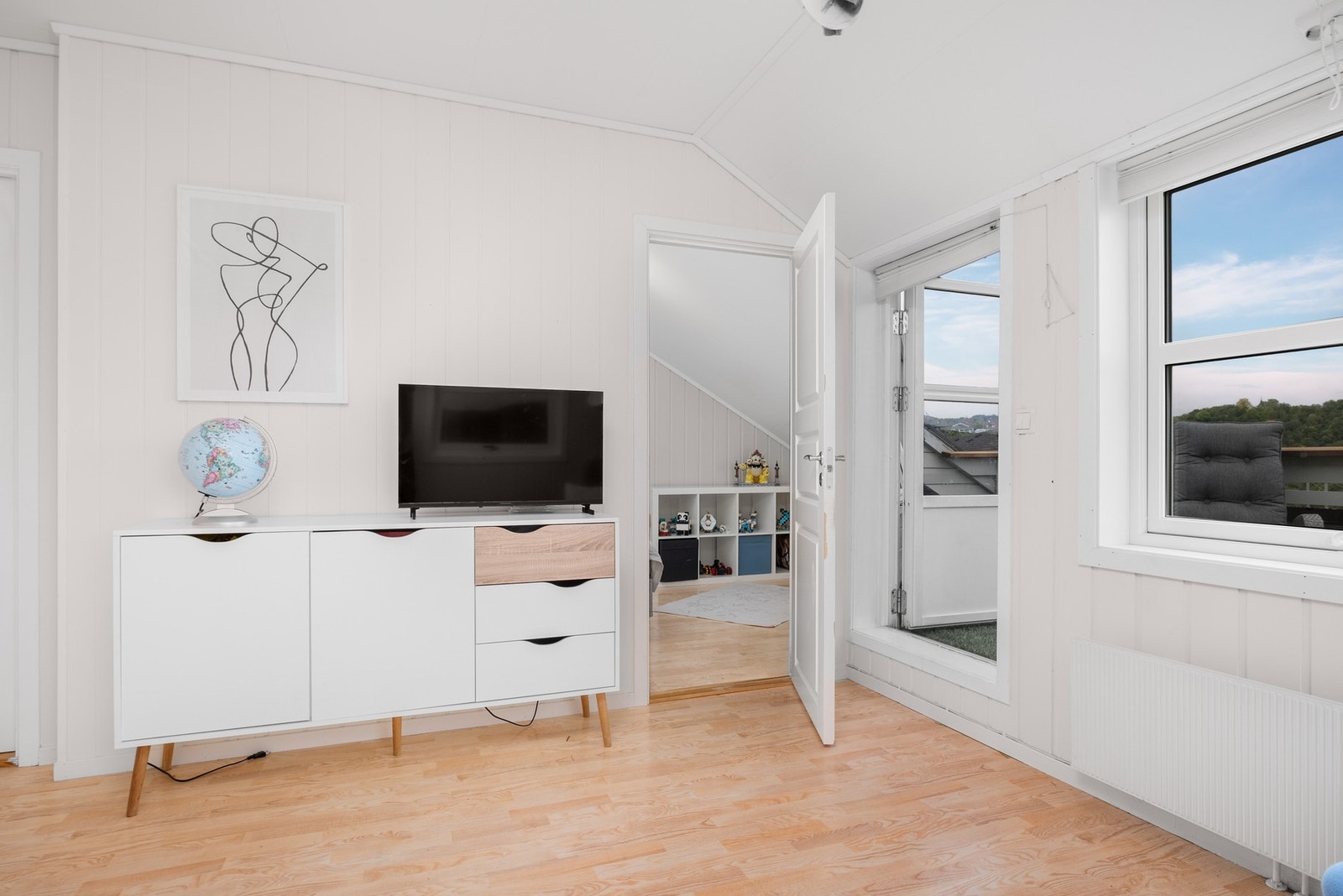 Loftstuen er på ca. 16,5 m² Galleribilde