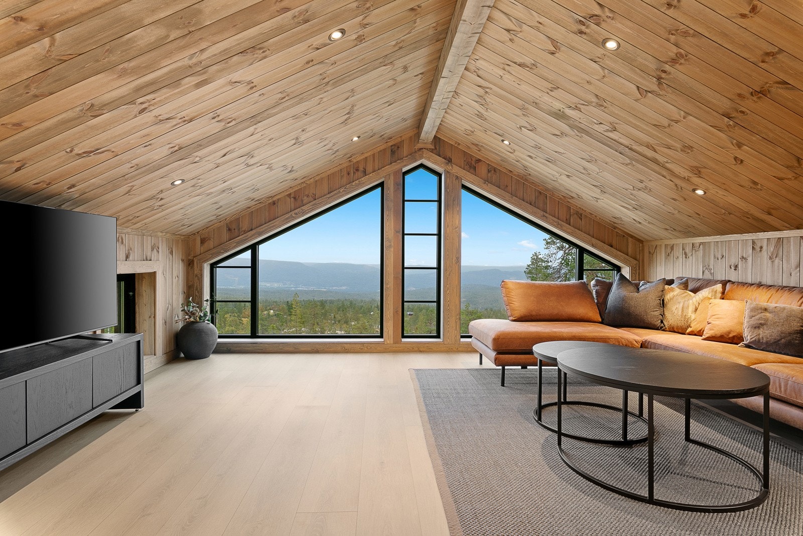 På den ene siden er det stue og romslig soverom. Nyt den fantastiske utsikten Galleribilde