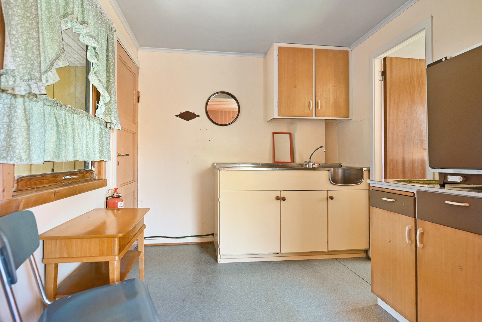 Kjøkkenet i den minste delen. Galleribilde