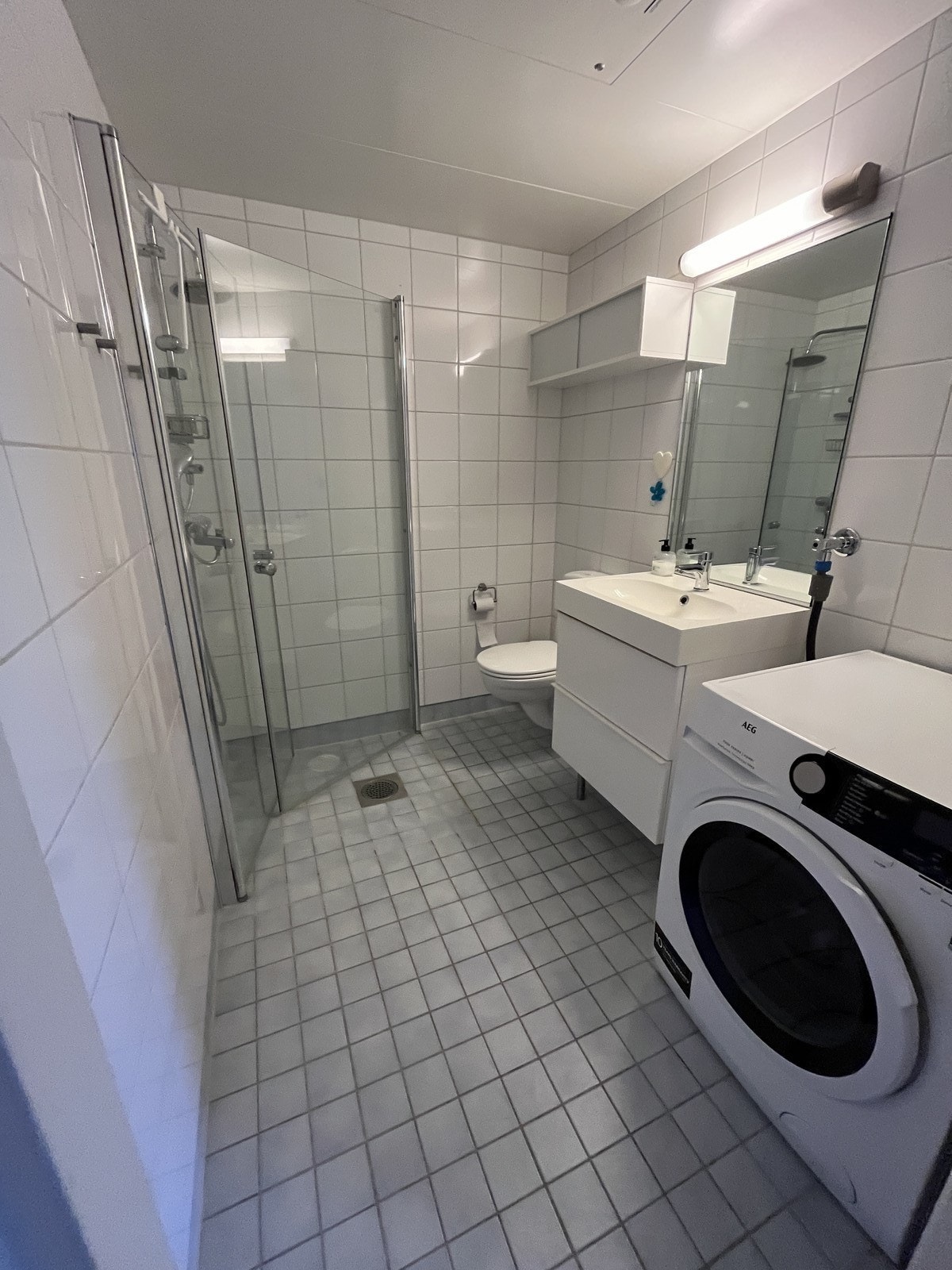 Flislagt bad med varme i gulvet. Galleribilde