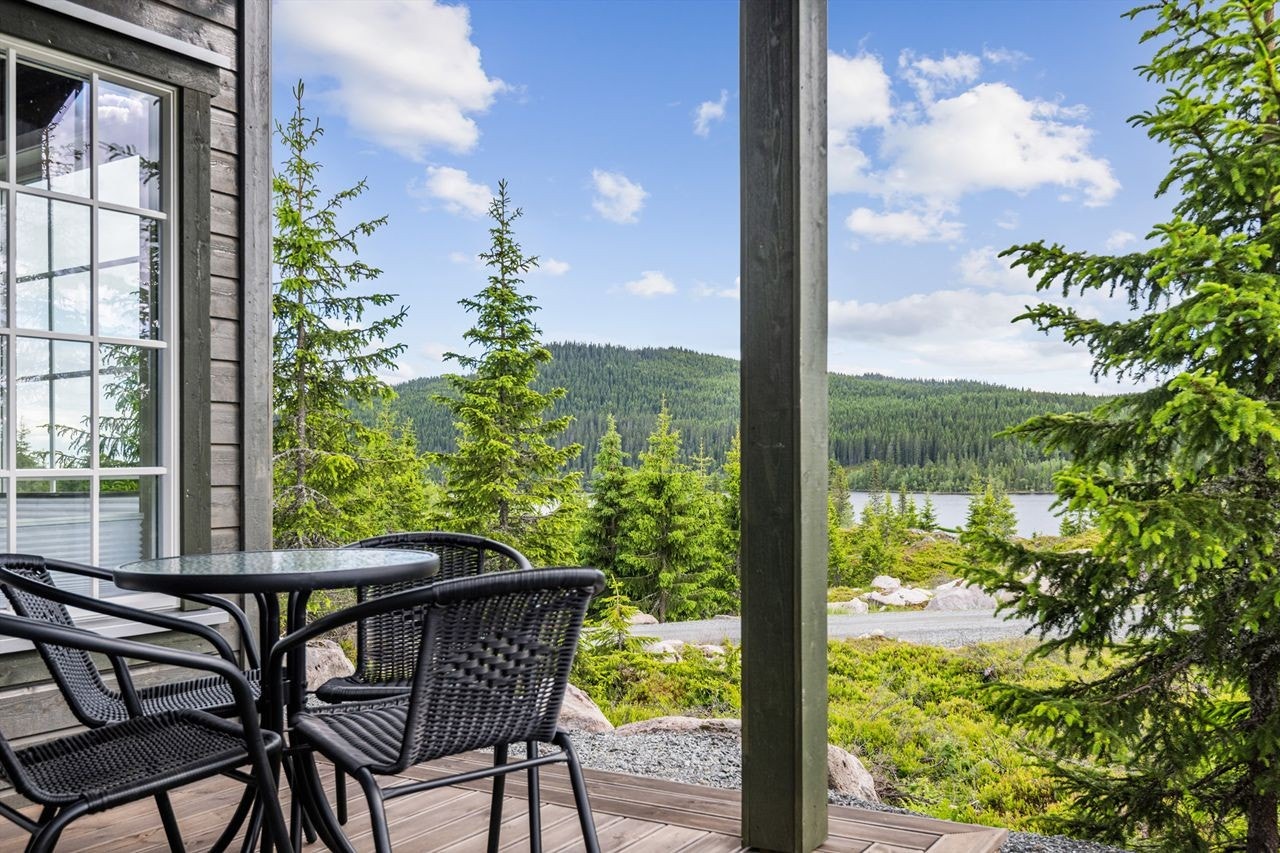 Adkomst ut til terrassen, hvor man kan nyte morgenkaffen. Galleribilde