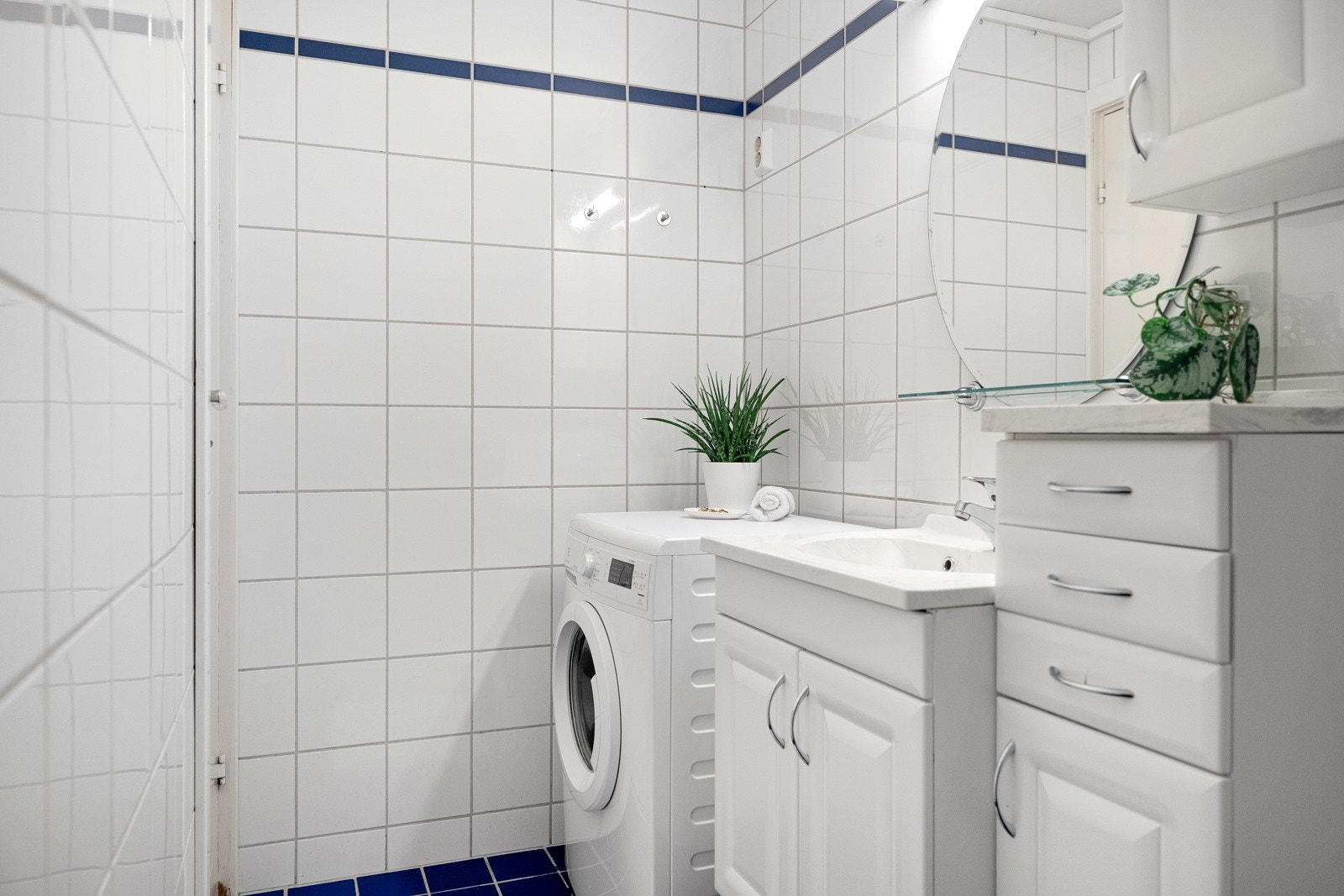 Badet har opplegg til vaskemaskin. Galleribilde