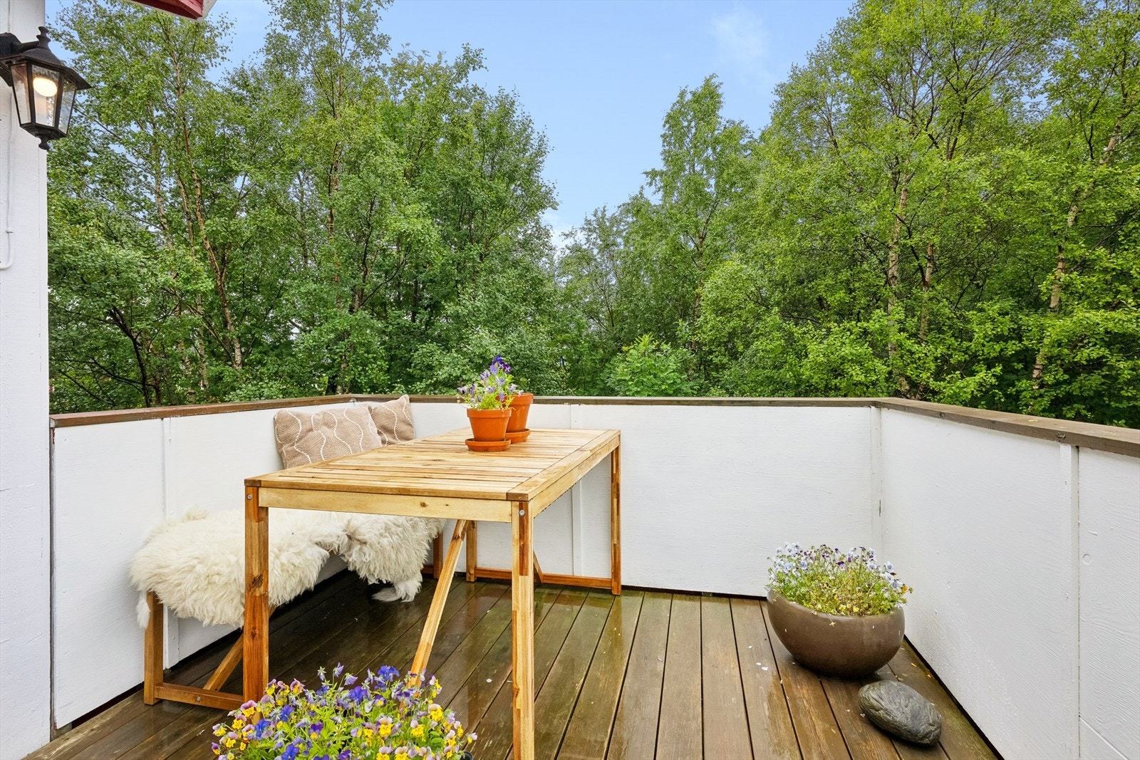 Balkongen er lun og tilbaketrukket. Galleribilde