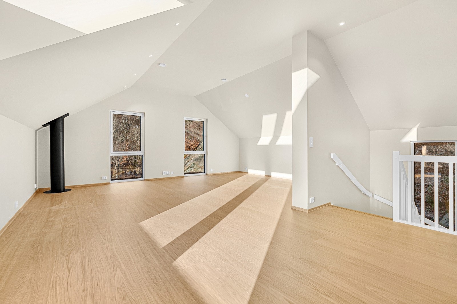 I andre etasje har en en stor åpen loftsstue Galleribilde