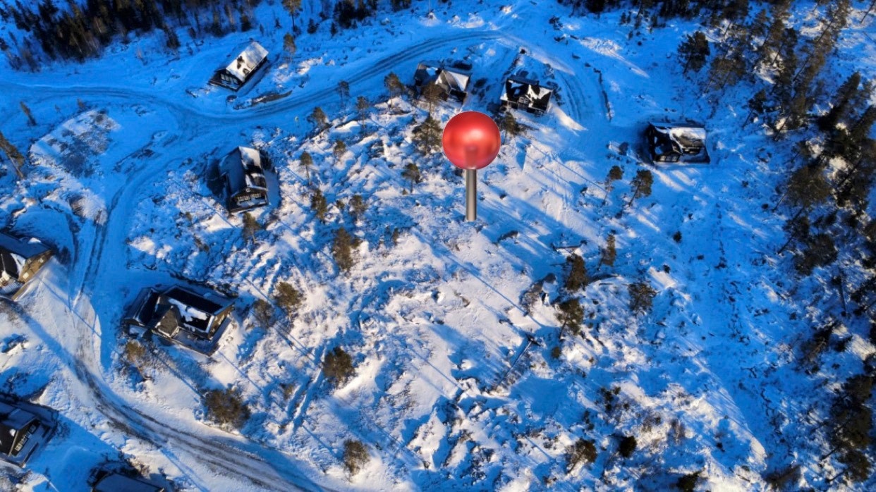 Tomta ligger ca der nåla er på bildet. Galleribilde