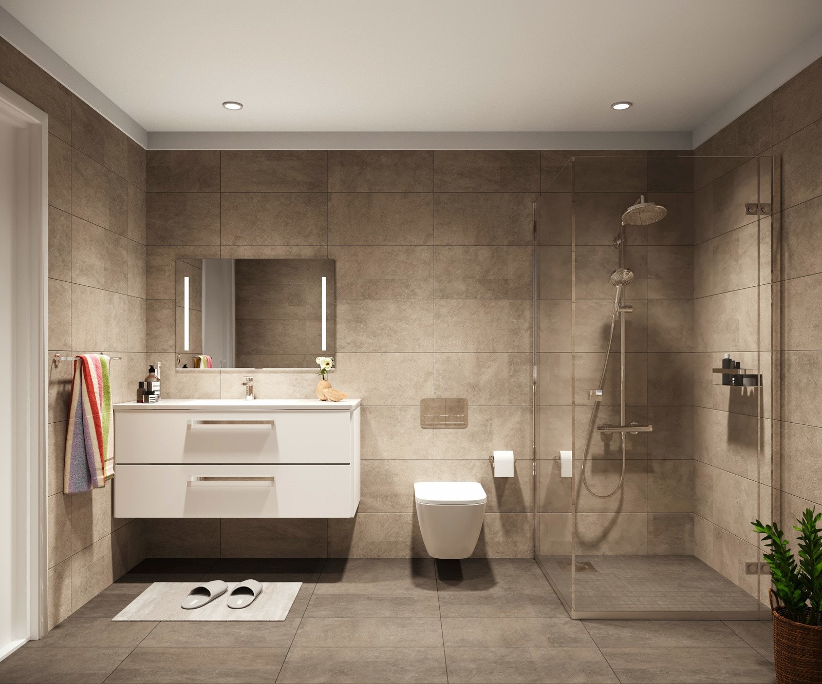 Boligen får to moderne bad, ett i hver etasje. Badene har delikate fliser, gulvvarme og dusj. Badet i første etasje får opplegg for vaskemaskin og tørketrommel. Galleribilde