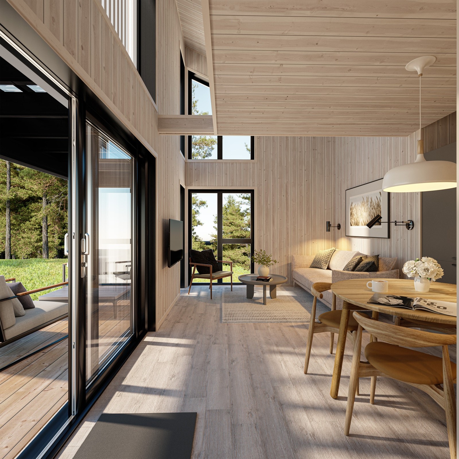 Åpent mellom kjøkken og stue, naturen tett på gjennom gjennom store vindusflater; skyvedør ut til overbygd terrasse, med gjennomsiktige takplater. Galleribilde