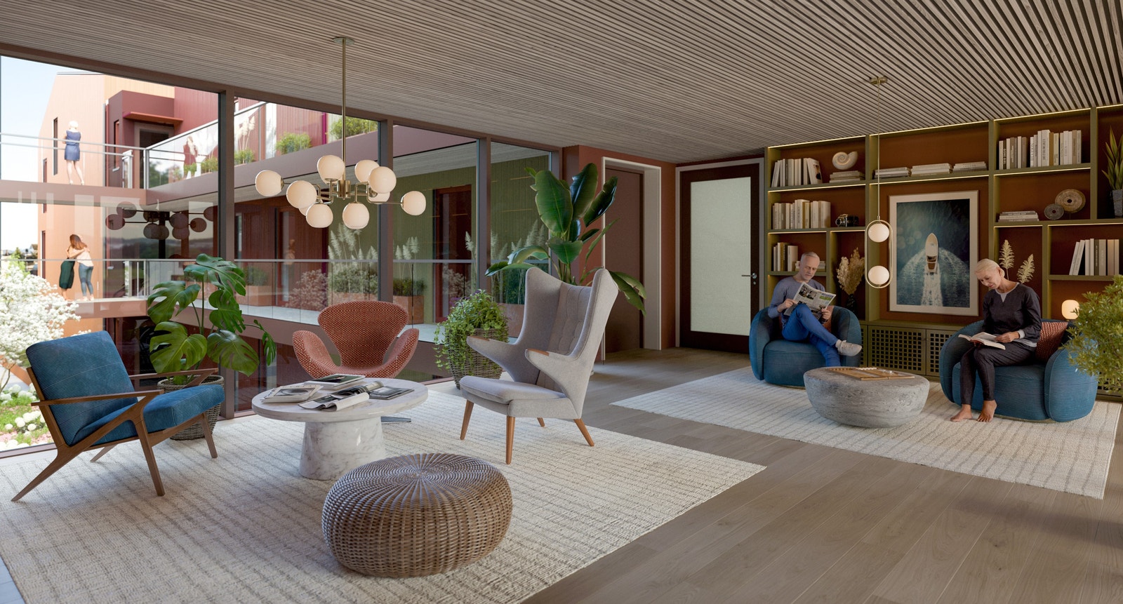 Felles loftstue i 3. etasje innredet med sittegrupper, bokhylle og kaffekrok. Galleribilde