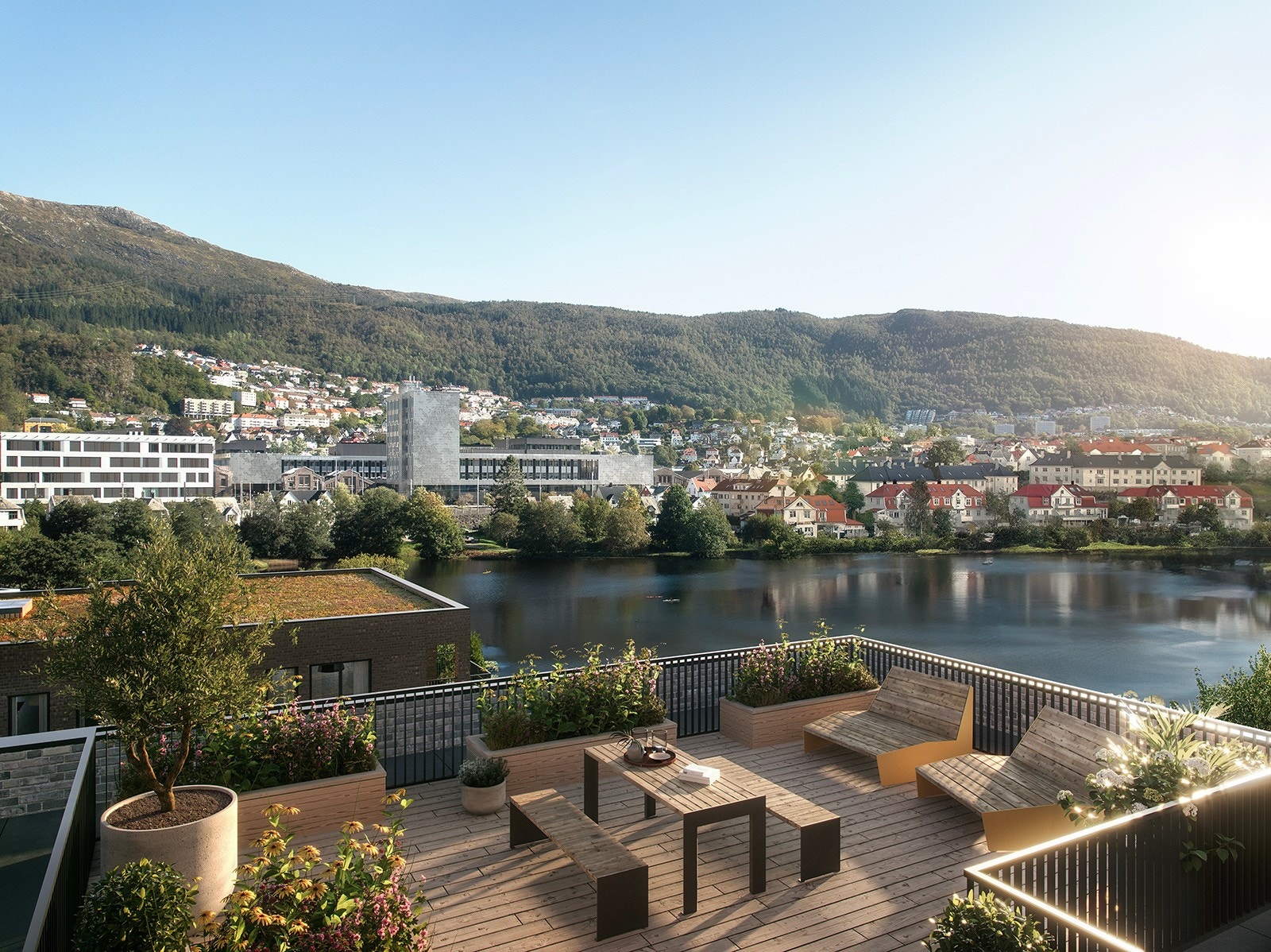 I hus B kommer det en felles takterrasse i 7.etasje. Illustrasjonsbilde er fra takterrassen i hus C. Avvik vil forekomme. Galleribilde