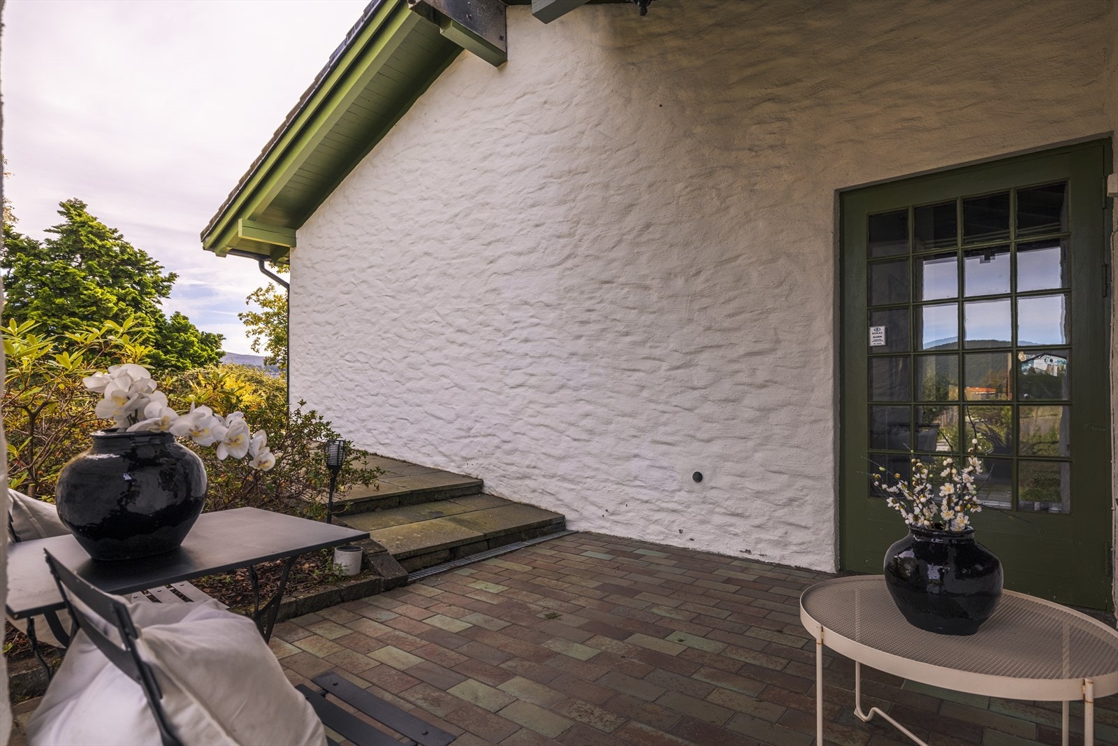 tesone med skifersteins platting. Galleribilde