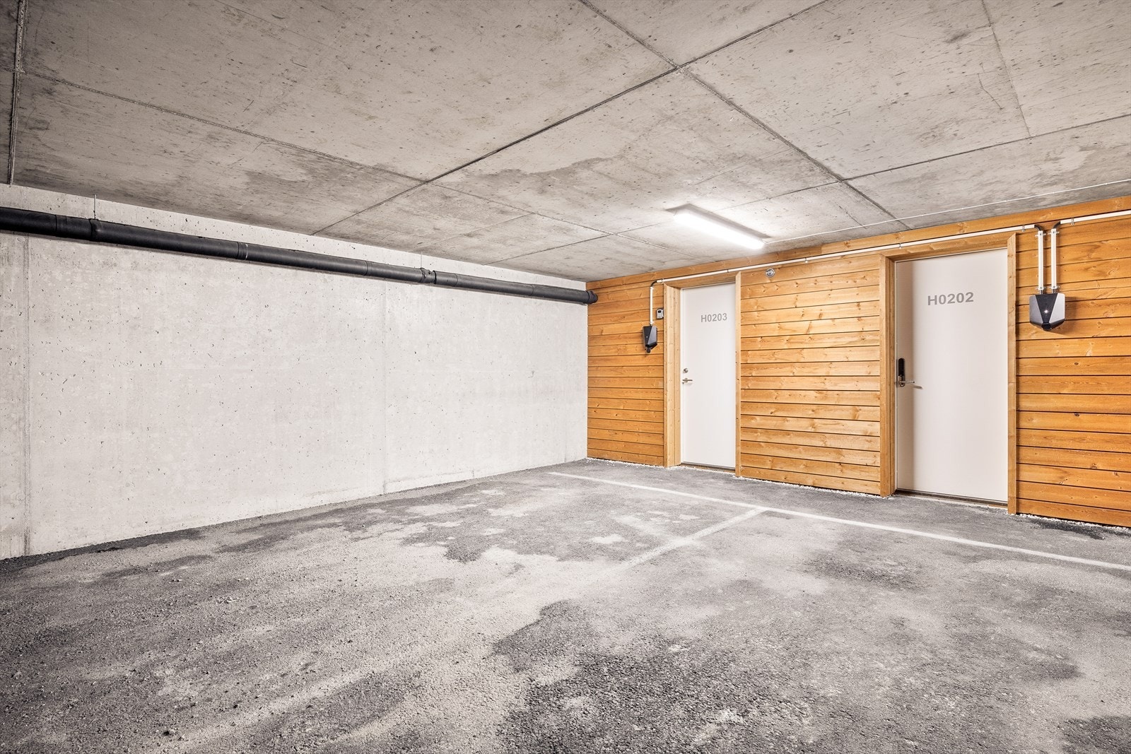 Parkering med elbillading i felles carportanlegg Galleribilde