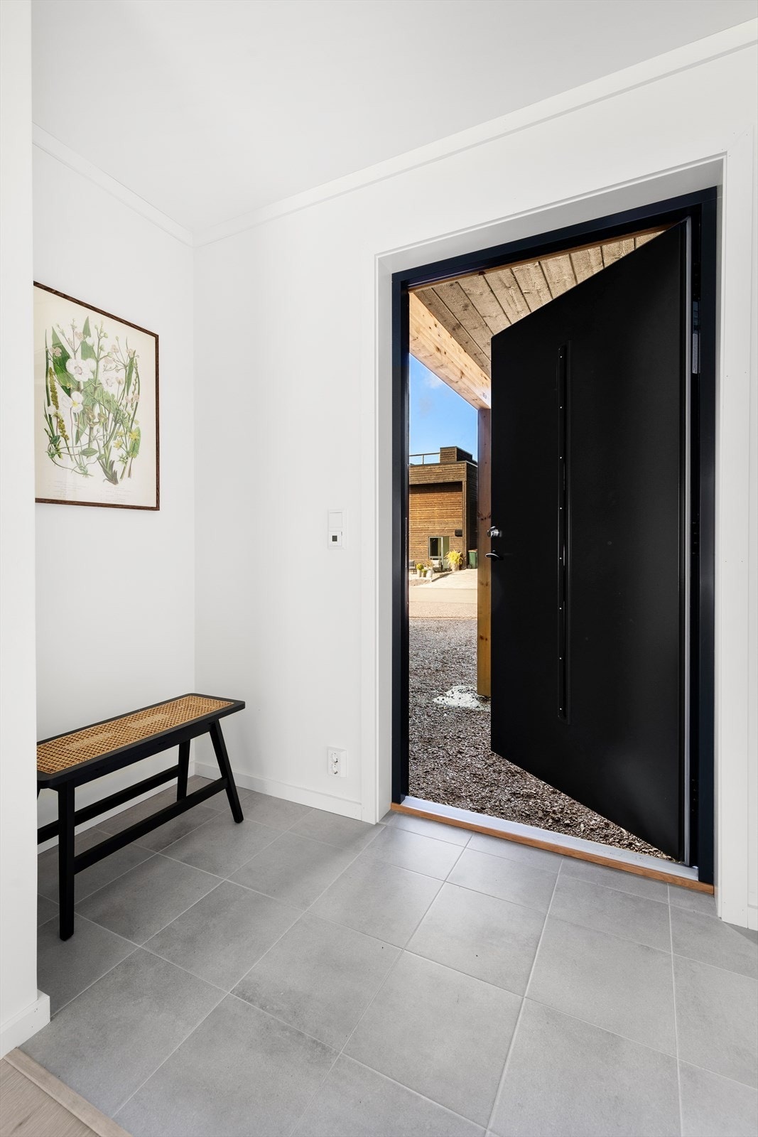 Entré med flis på gulv med varmekabler Galleribilde