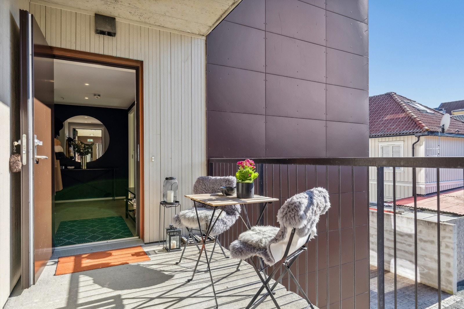 Ved inngangspartiet har man mulighet til å ha utemøblement. Galleribilde