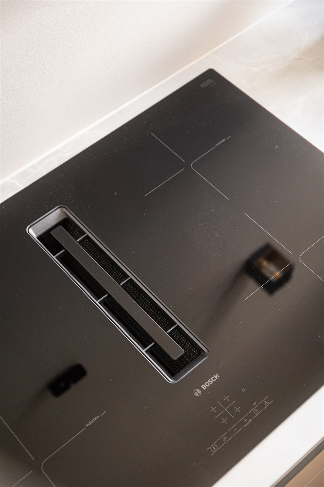 Induksjonstopp med integrert vifte. Galleribilde