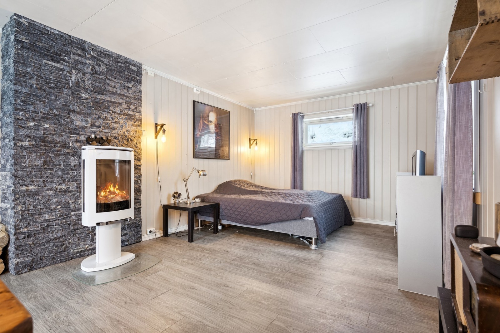 Vedovnen bidrar til en lun atmosfære samt rimeligere oppvarmingskostnader. Galleribilde