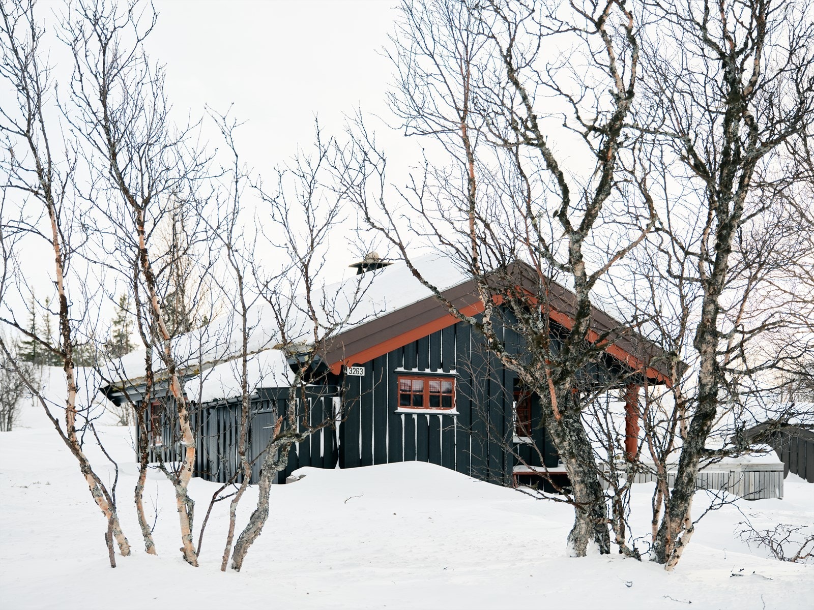 Fritidsboligen ligger i et godt etablert hytteområde ved foten av Rondane. Galleribilde