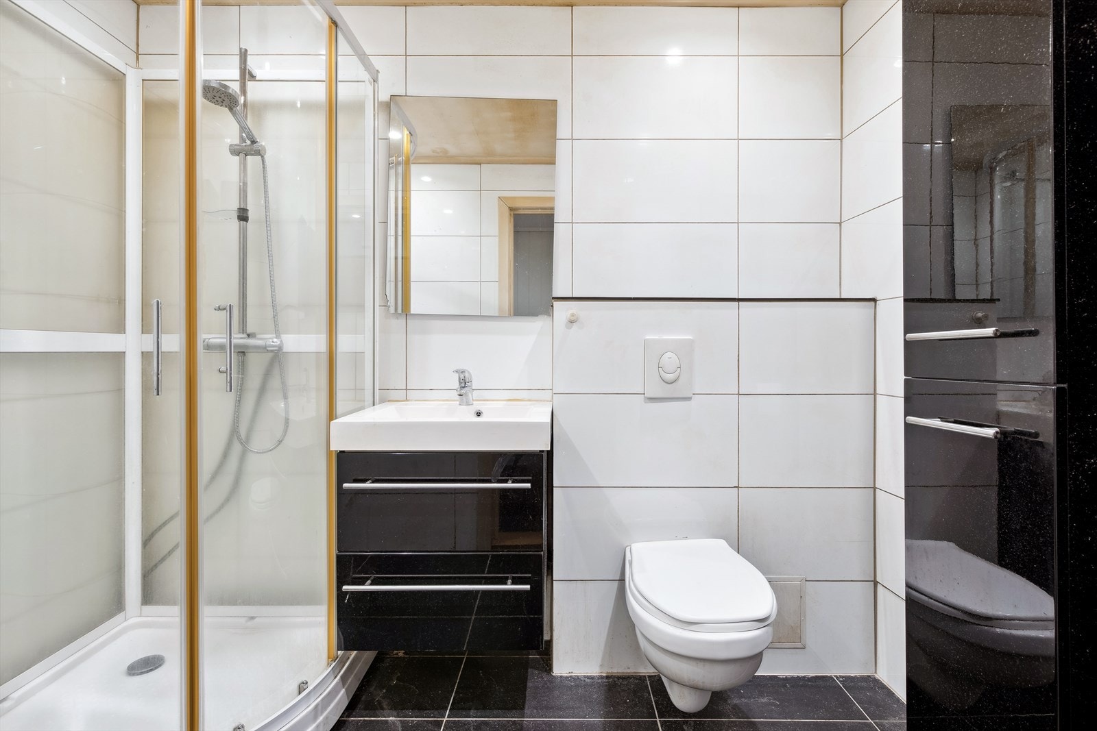 Flislagt bad med gulvvarme. Galleribilde