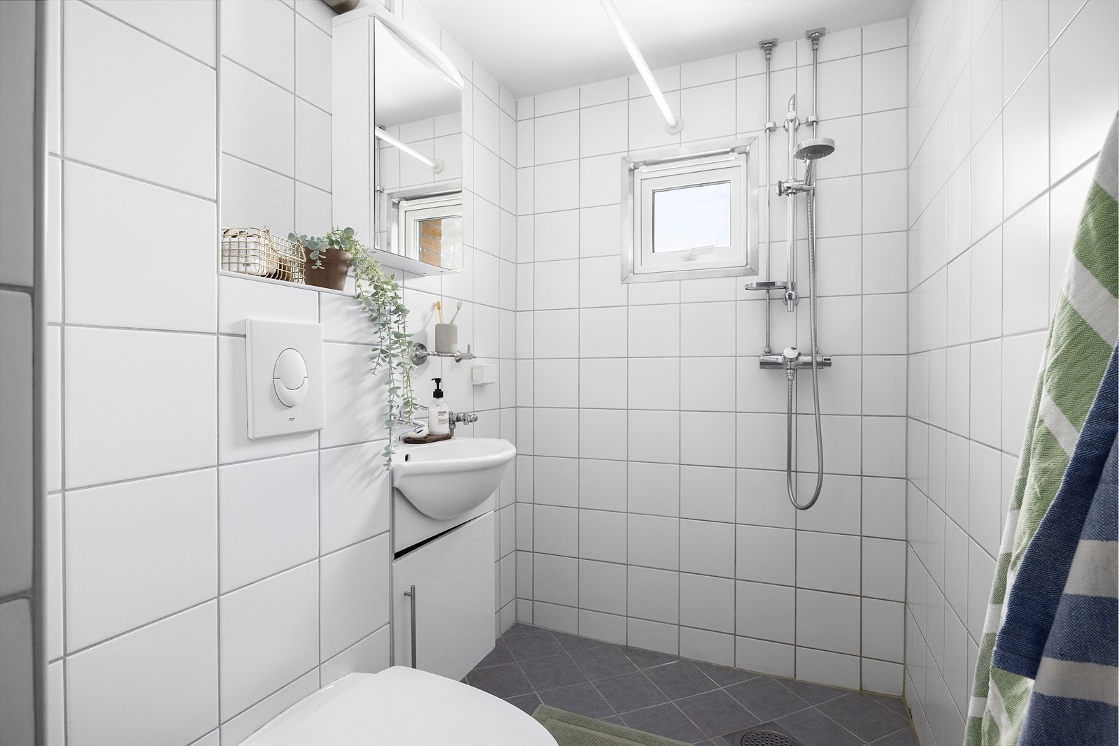 Pent flislagt bad tatt i regi av borettslaget. Galleribilde