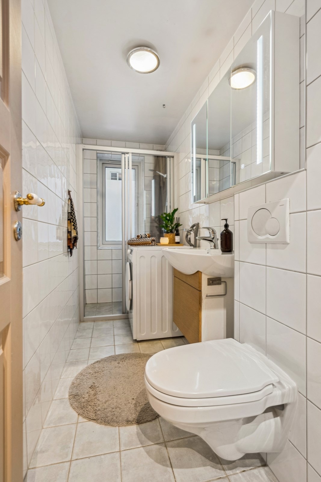 Plass for vaskemaskin på badet Galleribilde