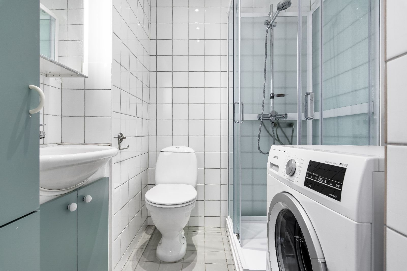 Bad med vaskemaskin Galleribilde