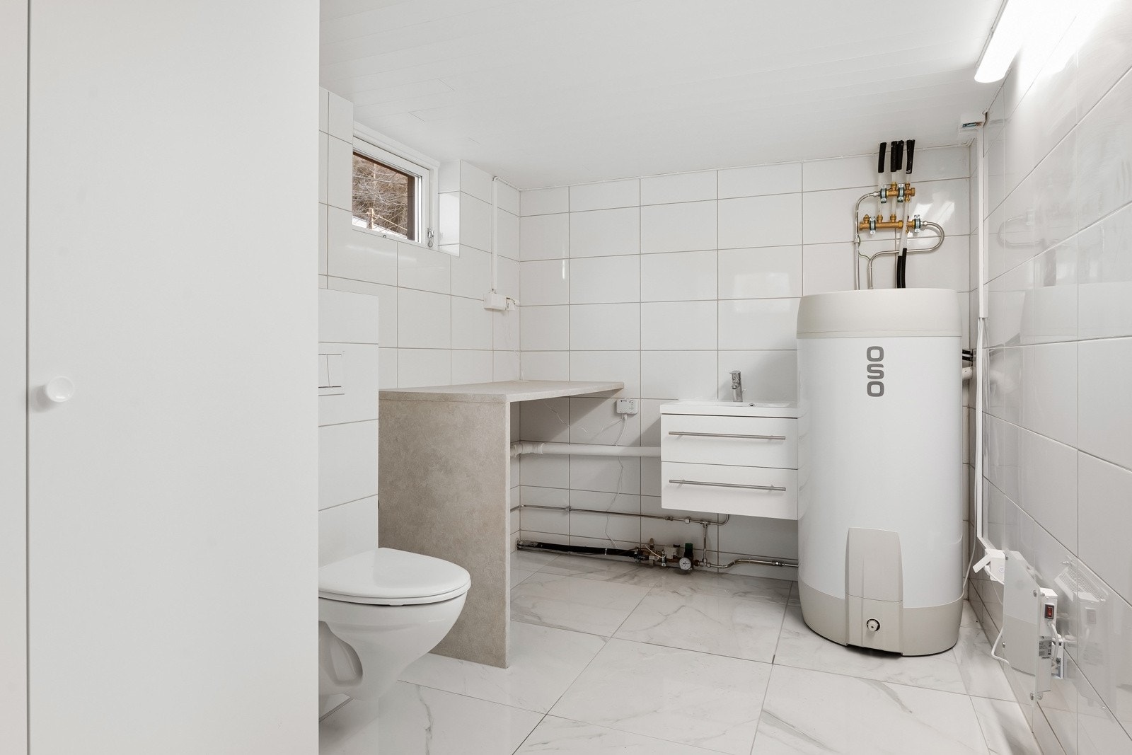 Velkommen ned i kjeller og dette nyoppussede vaskerommet. Galleribilde