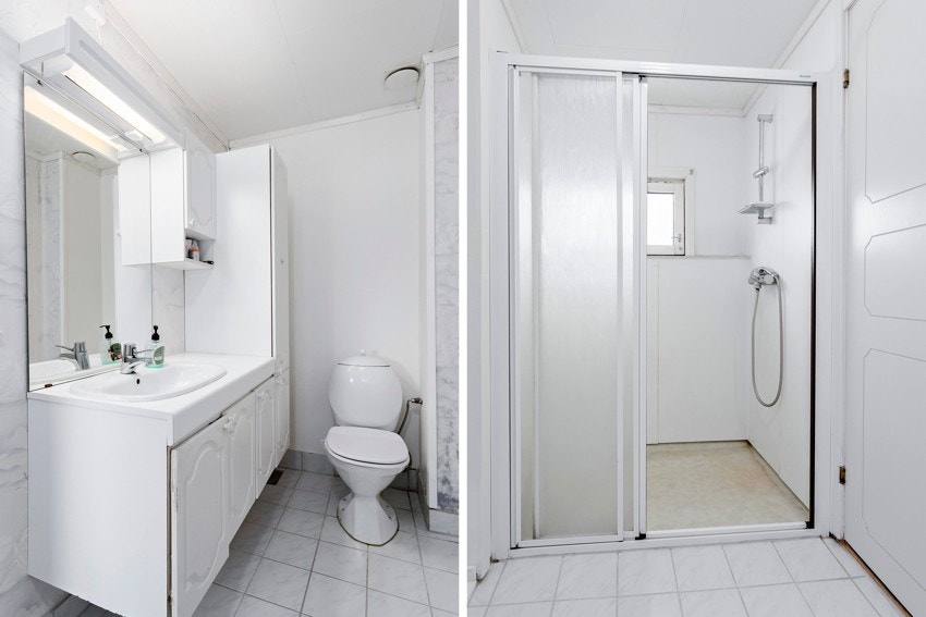 Bad med flislagt gulv og malte, slette flater på vegg. Badet består av dusjnisje med skyvedører, vegghengt servant med overskap og speil. Galleribilde