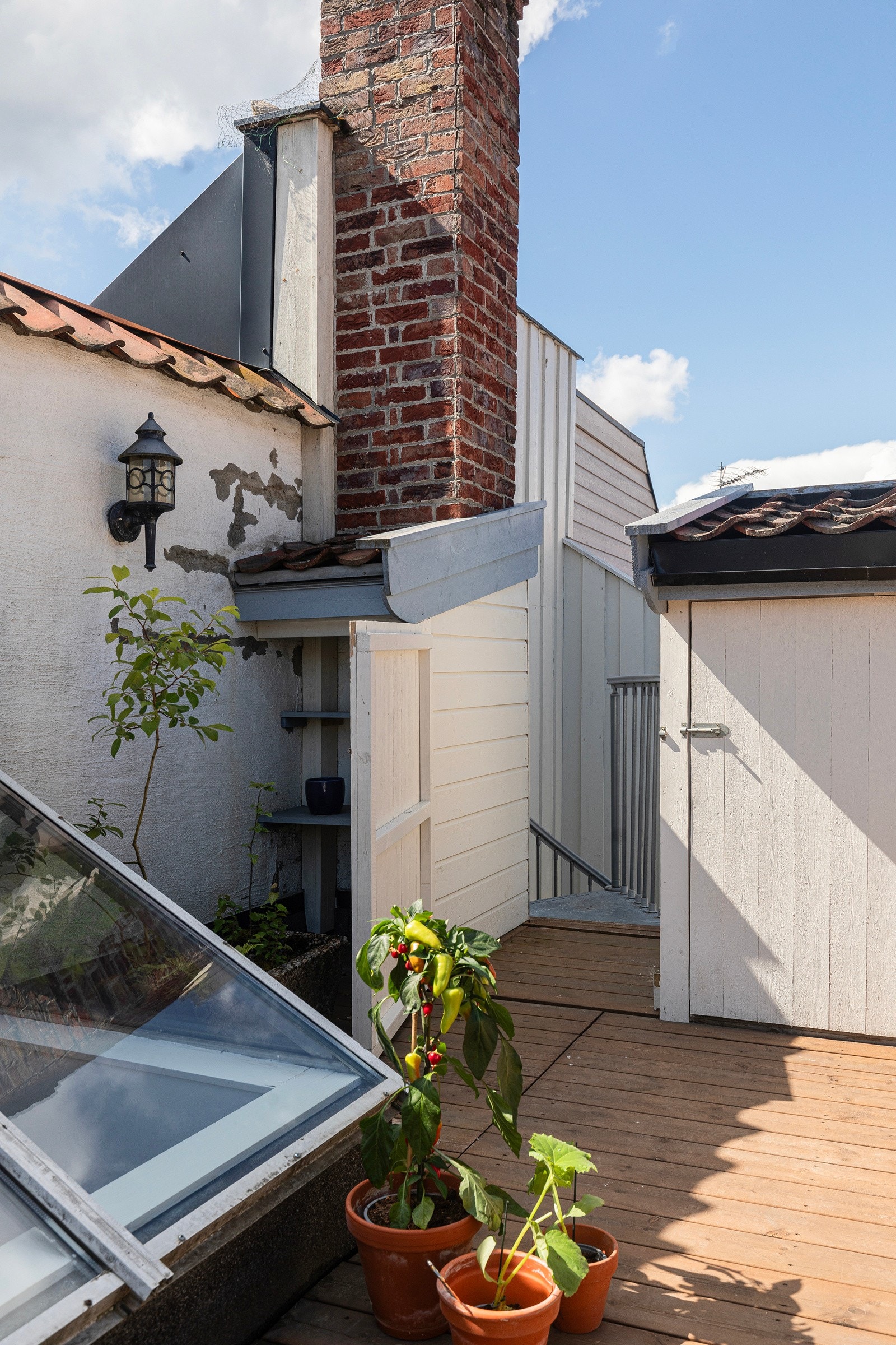 Fra takterrassen har man egen branntrapp ned til portrommet. Galleribilde