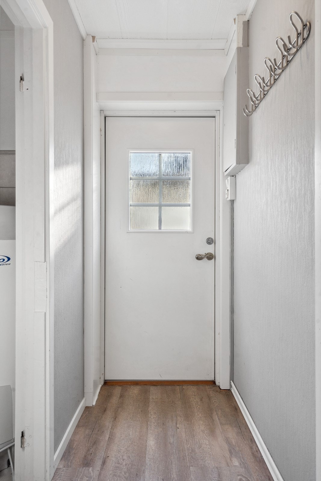 Velkommen inn! Forbi inngangsdøren venter en romslig entré. Galleribilde