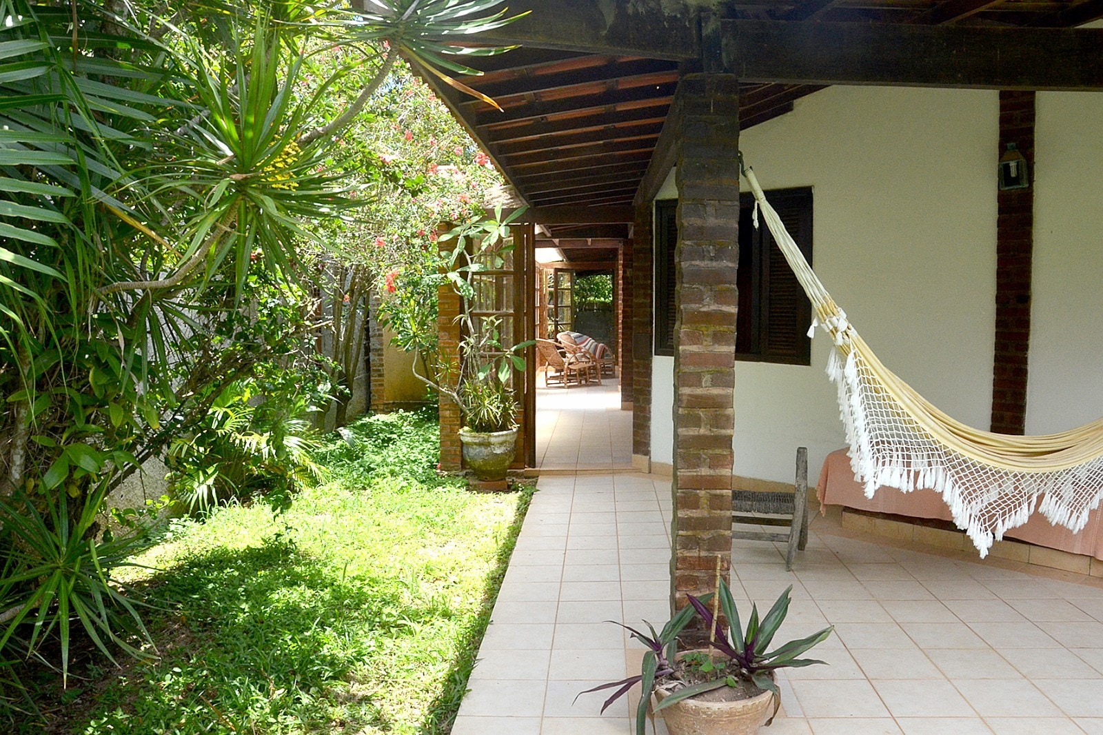 Et av eiendommens mange sjarmerende uteplasser. Galleribilde