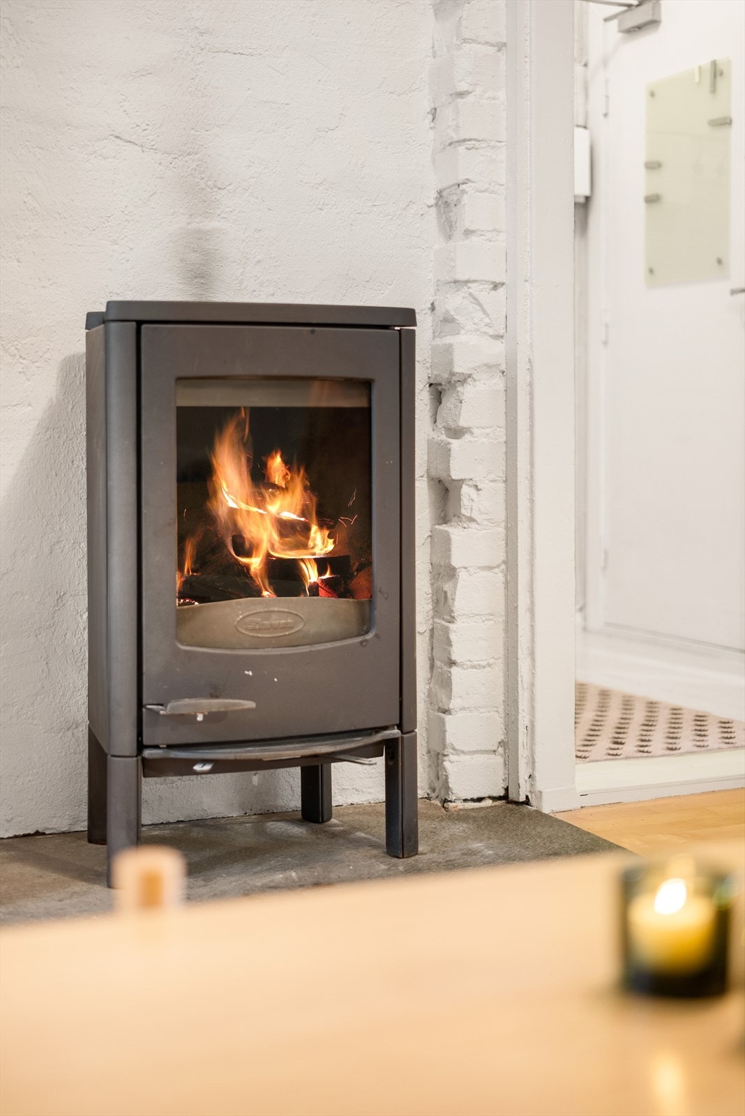 Koselig vedovn. Galleribilde