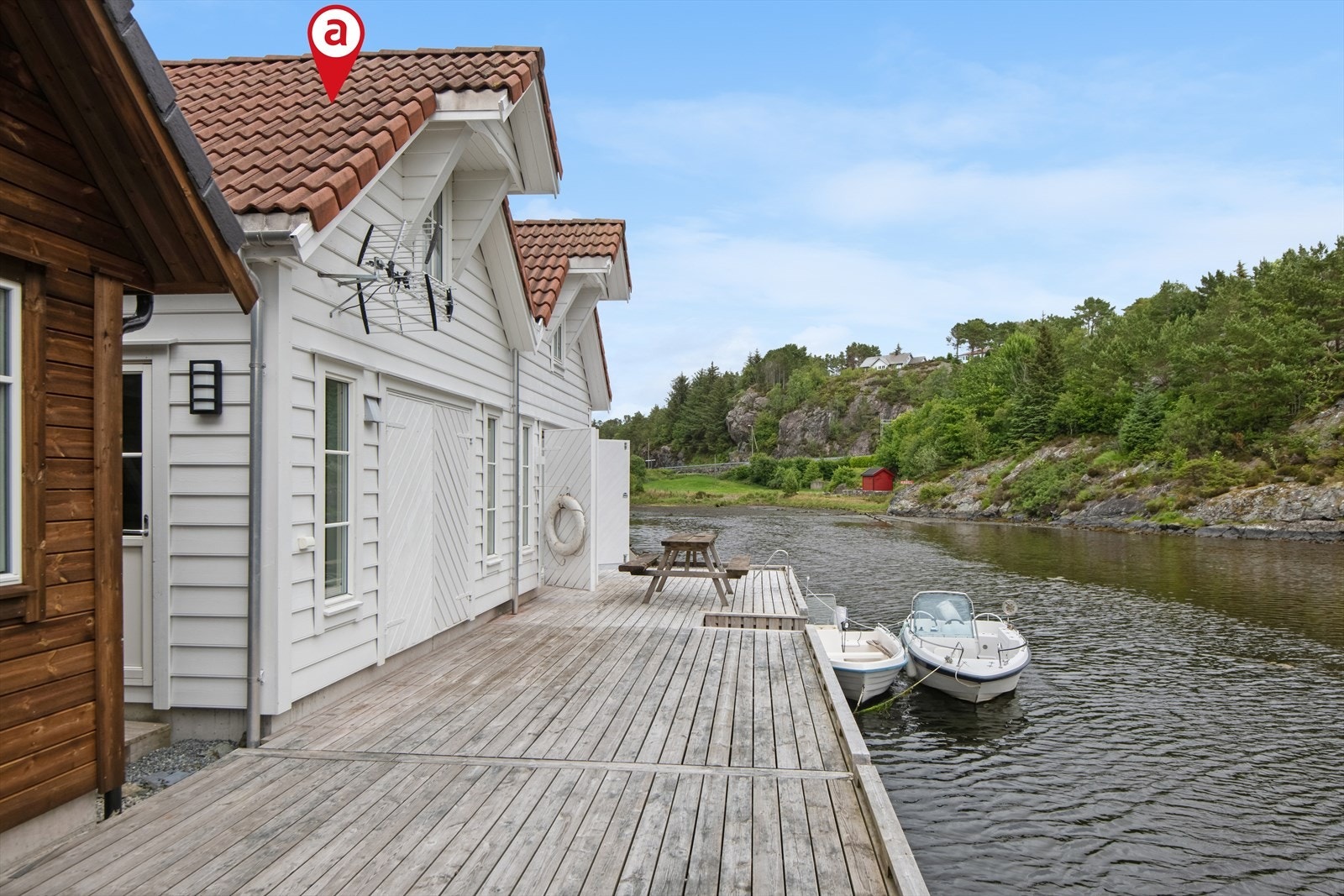 Velkomen til Naust i Mælandsvågen og dette flotte naustet som no er for sal - Presentert av Oliver Farji i Aktiv Eiendomsmegling Galleribilde