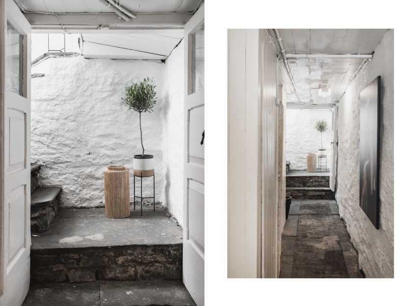 Inngang til leiligheten via kjellerhals og opp i bakgård. Galleribilde