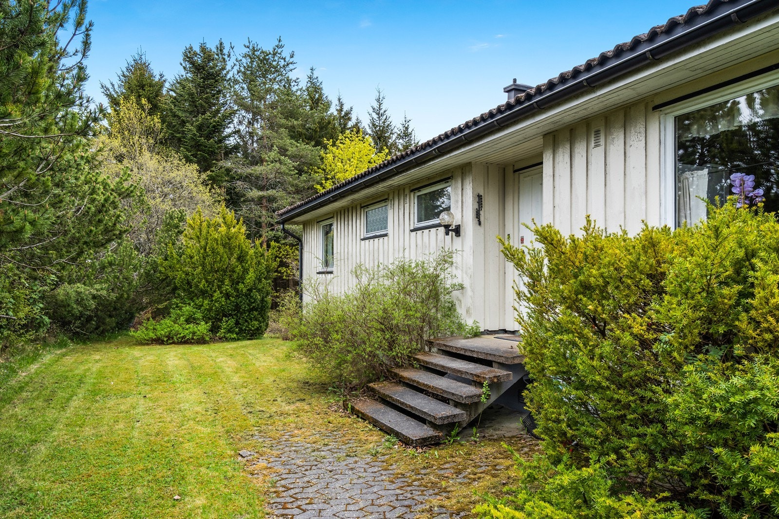 Inngangen via vaskerommet Galleribilde