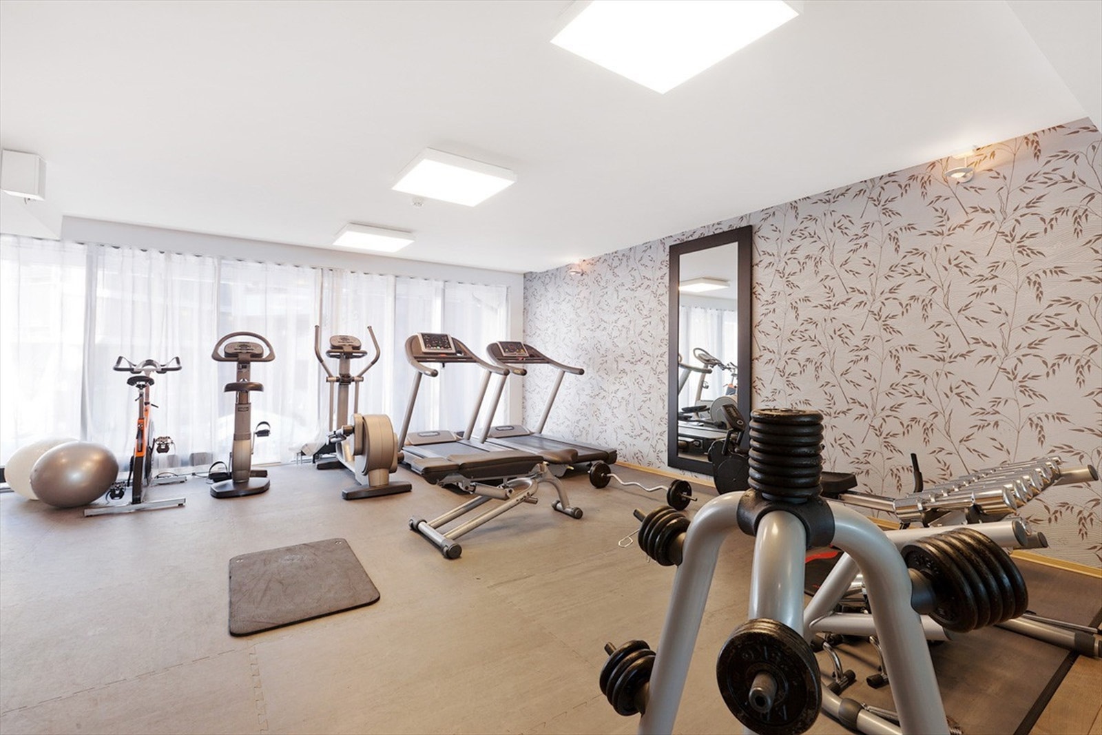 Trivelig treningsrom står til fri disposisjon for kunder av plusskonseptet. Galleribilde