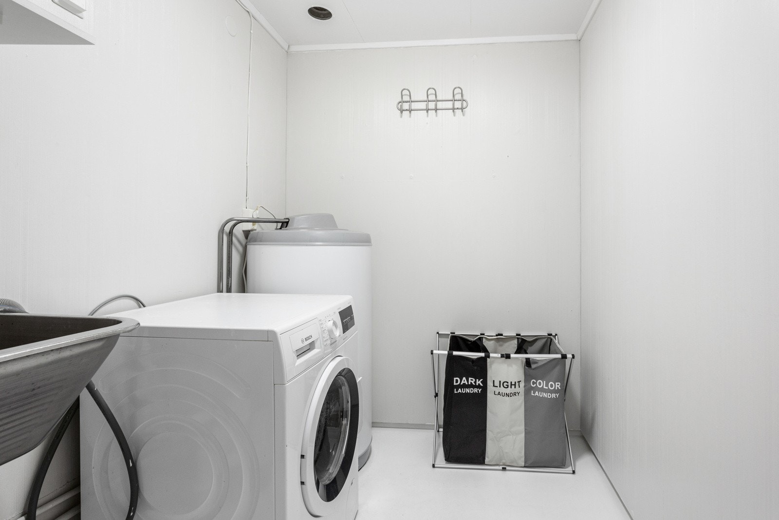 Vaskerommet ligger praktisk til i boligens 1. etasje . Galleribilde