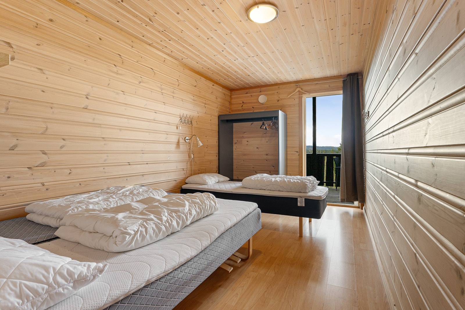 4 av soverommene har også tilgang til balkong. Galleribilde