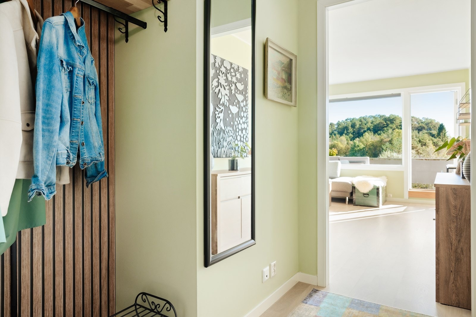 Fra leilighetens entré blir du naturlig ledet inn i leilighetens stue. Galleribilde