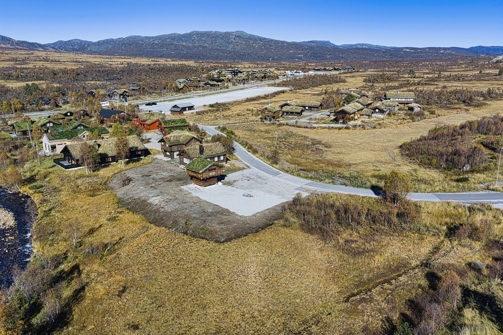 Ferdig opparbeidet tomt med historisk stabbur - rett ved langrennsløyper - vid utsikt og perfekte solforhold Galleribilde