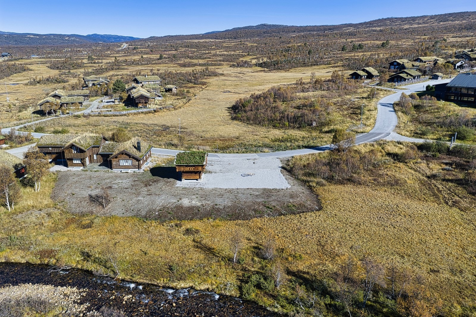 Ferdig opparbeidet tomt med historisk stabbur - rett ved langrennsløyper - vid utsikt og perfekte solforhold Galleribilde