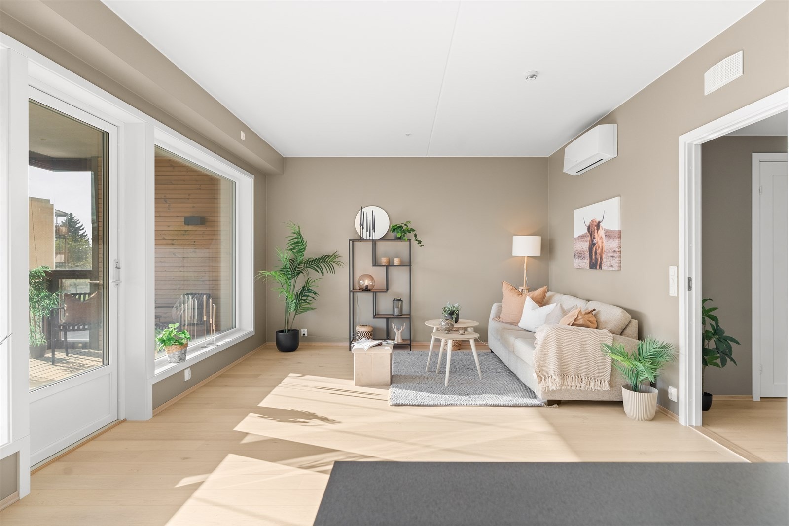 Leiligheten har en åpen og sosial planløsning. Galleribilde