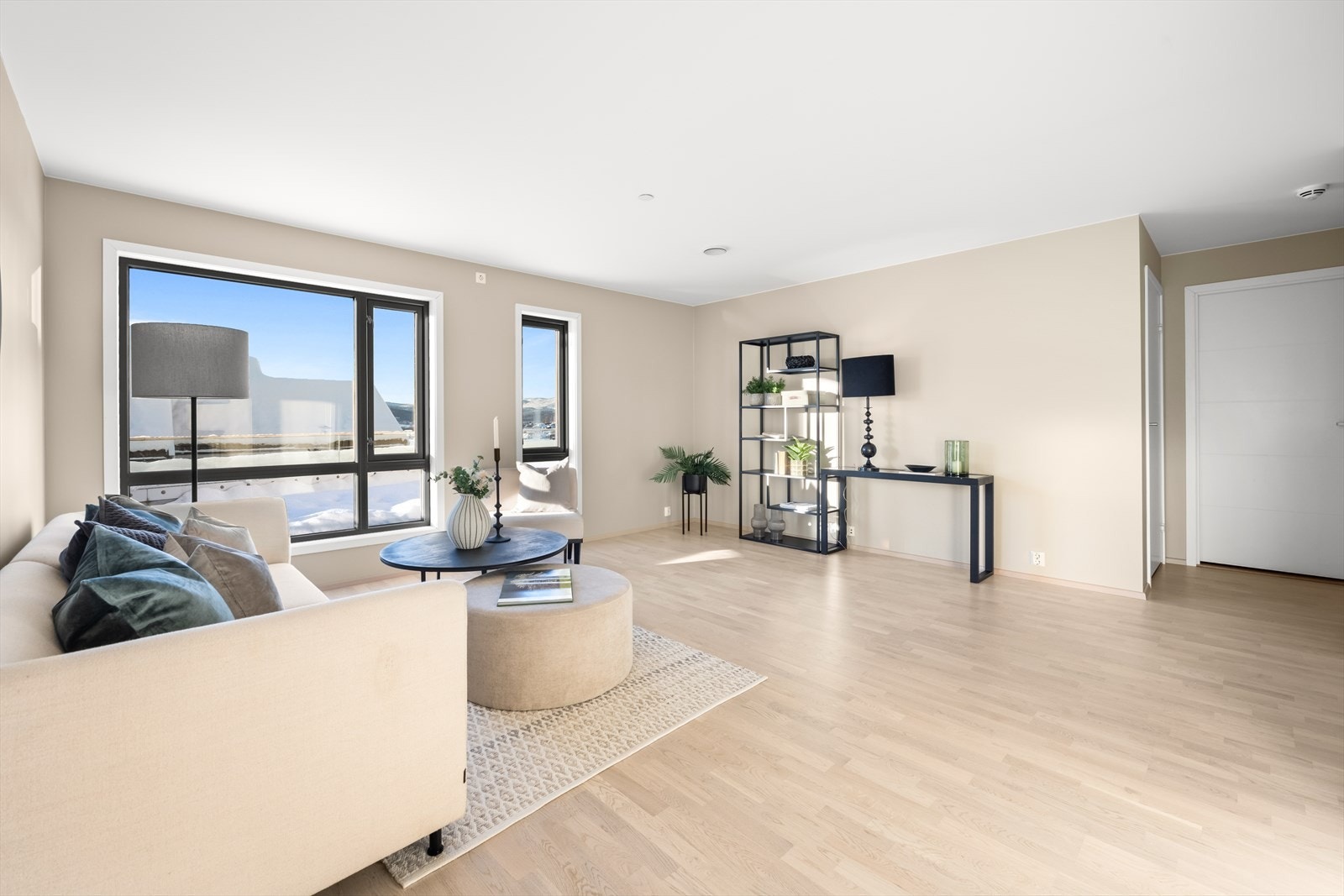 Leiligheten er holdt i delikate farger. Galleribilde