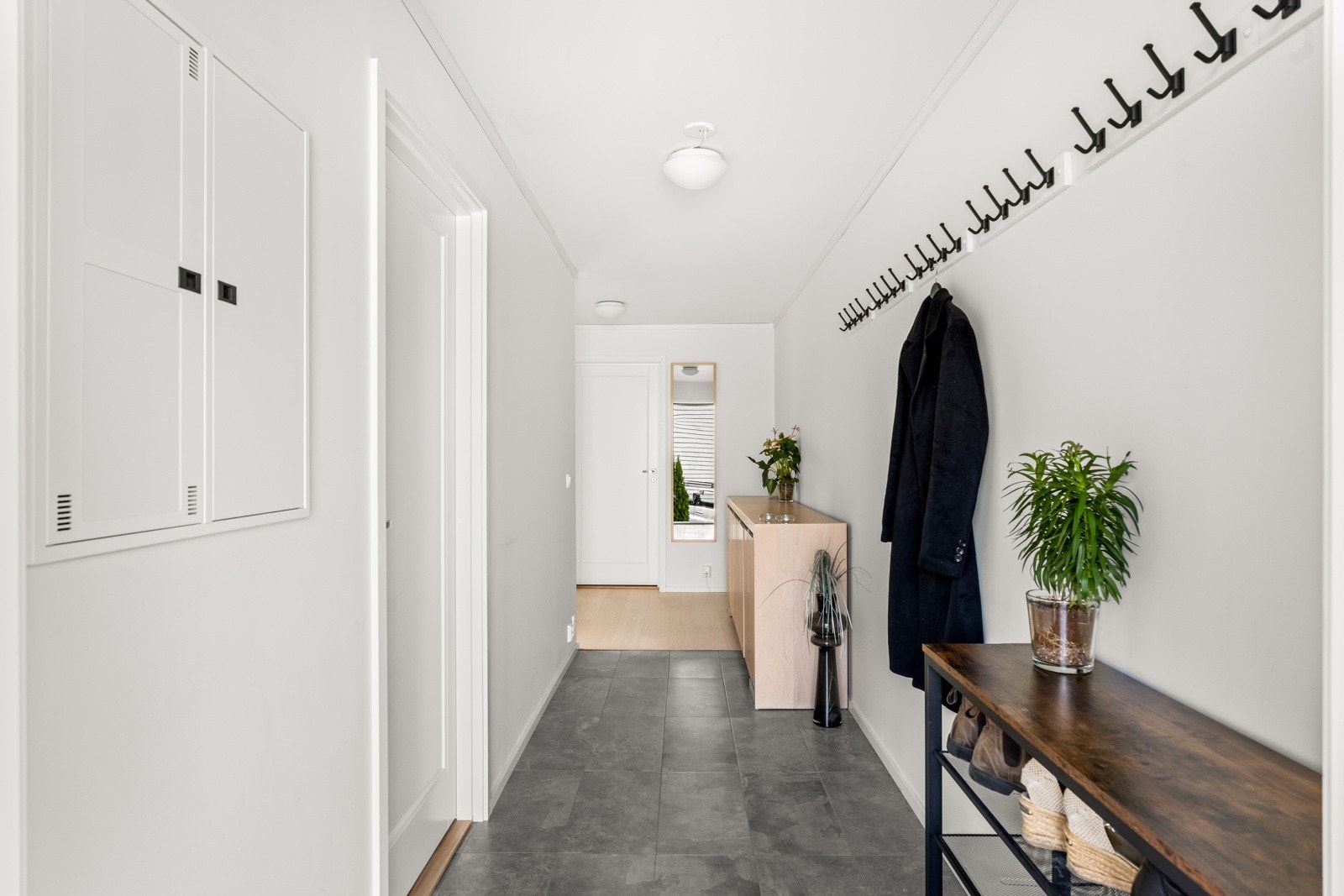 Leiligheten har gjennomgående lyse farger Galleribilde