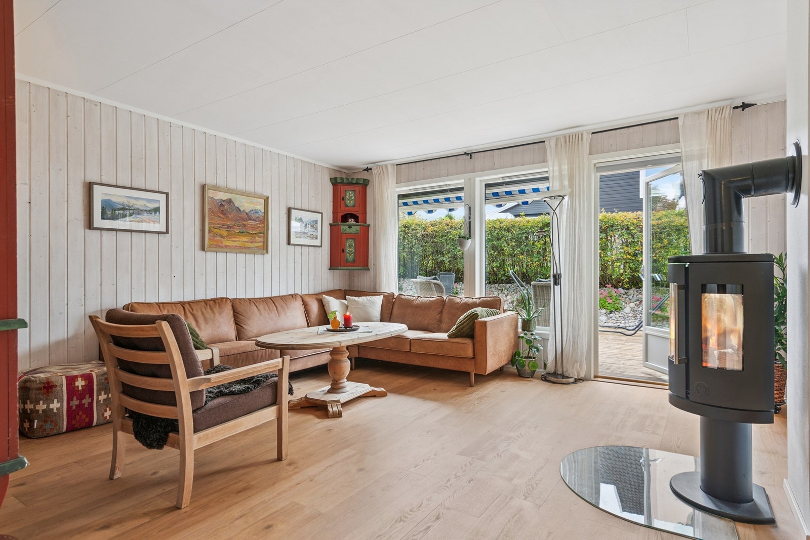 En peisovn gir både varme og en hyggelig atmosfære i rommet. Galleribilde