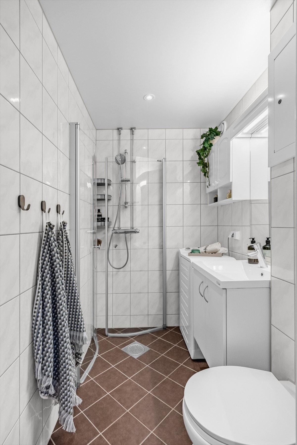 Pent, flislagt bad rehabilitert i regi av borettslaget i 2015. Galleribilde