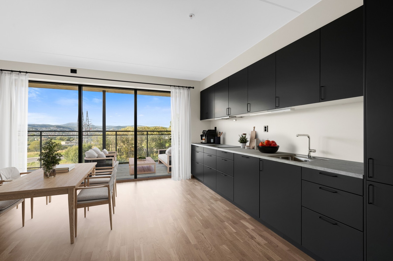 God plass til en romslig spisegruppe, hvor man fint kan holde kontakt med gjestene mens man tilbereder måltidet (digitalt møblert). Galleribilde