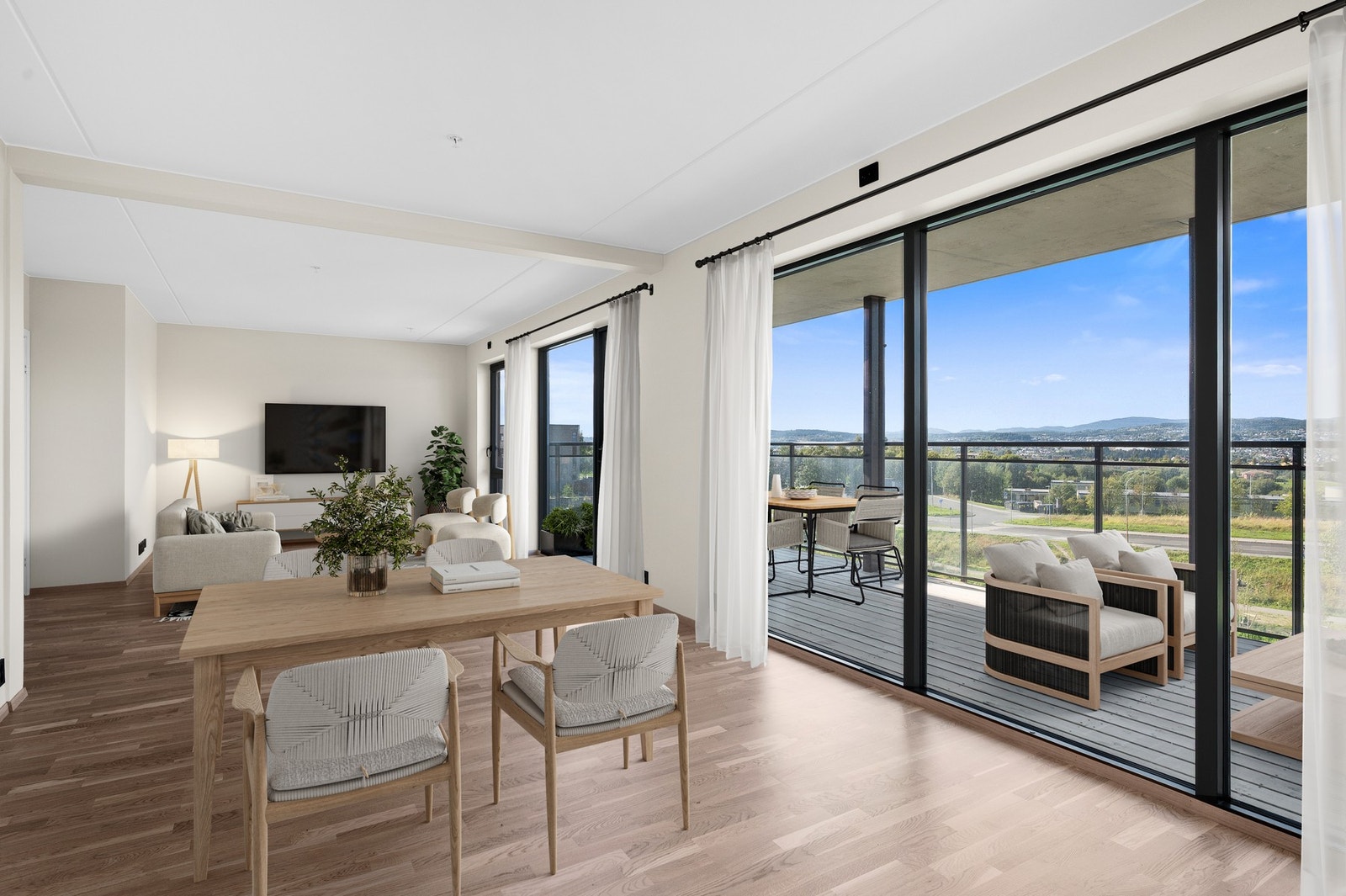 Åpen stue/kjøkkenløsning på ca 41,5 kvm (digital møblert). Galleribilde